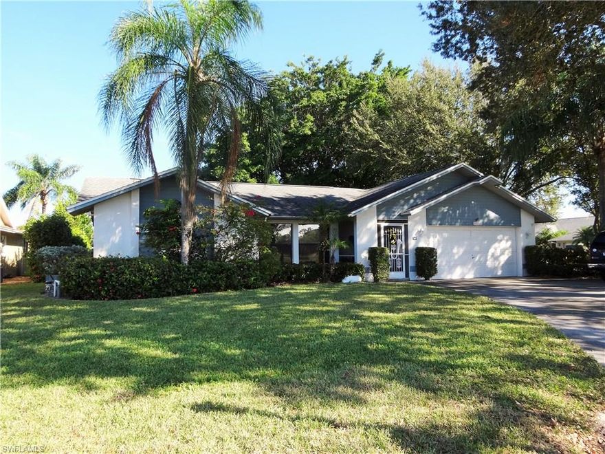 Priced to Sell Pool Home! Low HOA fees! Pet Friendly! Great home on corner lot in wonderful N. Naples neighbourhood. Split Bedroom floor plan, Living Room with Dining Area, Family Room and great kitchen with pass-through to lanai which is great for entertaining and eat-in area also.  One of the guest bedrooms is being used as a den/study and has a large walk-in closet.  Master Bedroom has sliders to the lanai. Spacious lanai with lovely lake views behind the home in a really wonderful area.
Regent Park is a highly sought after neighbourhood with two lighted tennis courts, a community pool and sidewalks. Located in N Naples approximately four miles from Vanderbilt Beach, about 30 minutes to RSW aiprort and in the A rated school zones of Pelican Marsh Elem, North Naples Middle, and Barron Collier High.