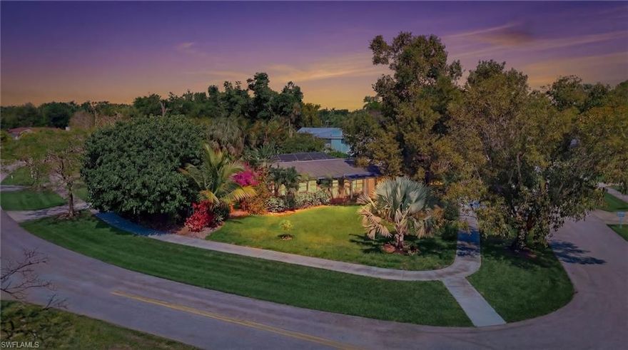 Great opportunity in the coveted McGregor corridor! With 3 bedrooms, 2 baths, pool + 2 car garage makes this home a rare find in 33901. Huge corner lot, lush landscaping and cozy front tree swing welcome you to this beautiful home and neighborhood. This property features over 1,600 Sq Ft of living area, bright & open layout, tile floors in main living areas and tons of storage. Spacious updated kitchen with built-in bar, granite counters and plenty of cabinet space. Split bedrooms, living room and additional family room are sure to offer an abundance of space. Additional features include a new AC in 2023, sprinkler system on a well and unique original exposed brick inside. The true highlight of this home is the stunning fenced backyard with a private fire pit area, screened pool and spacious pool deck that is great for entertaining. Come claim your piece of paradise in one of the most sought after areas in Fort Myers!