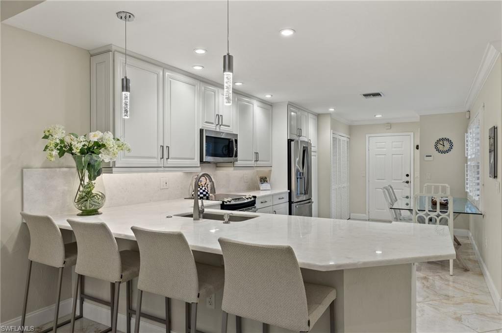 VILLAS AT PELICAN BAY - Residential