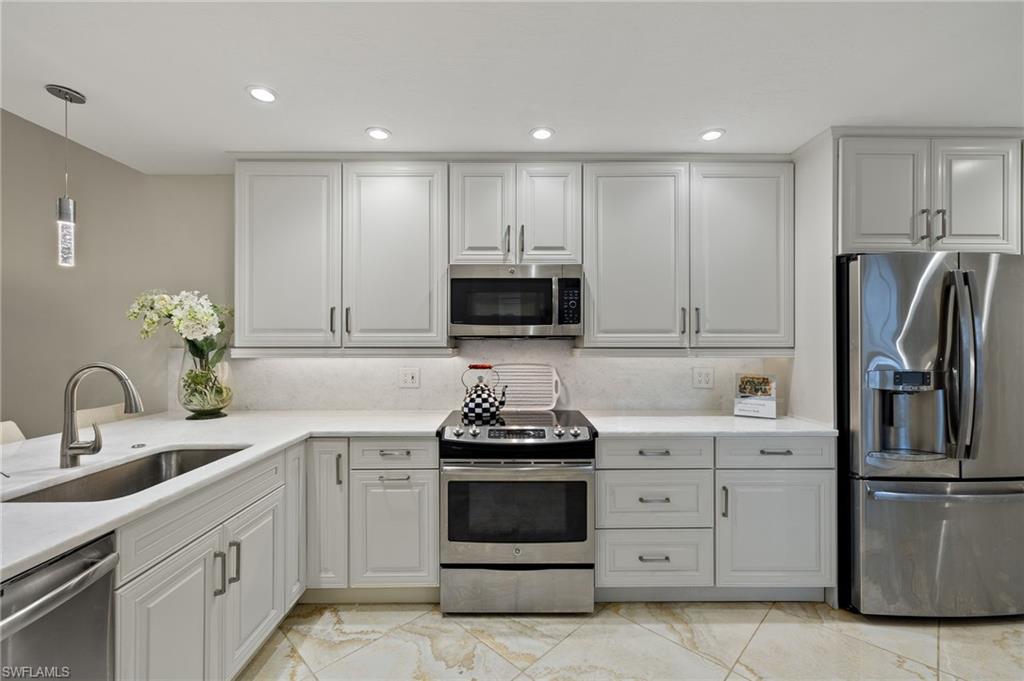 VILLAS AT PELICAN BAY - Residential