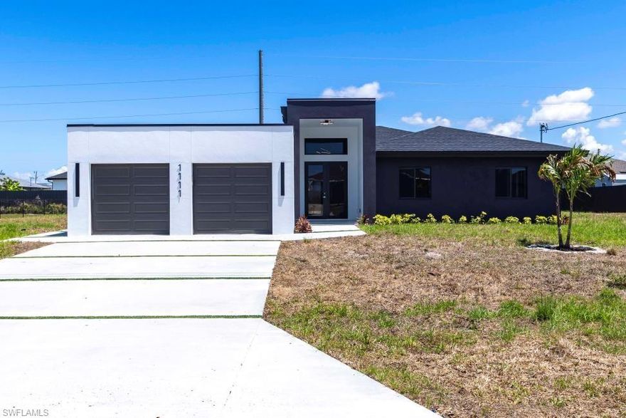 Modern Elegance Meets Everyday Comfort – Move-In Ready New Construction! Extra Lot Experience refined living in this brand-new, modern designed home offering 4 bedrooms, 2.5 bathrooms, and nearly 2,930 square feet of open-concept space. Soaring ceilings and sleek porcelain flooring set the tone for upscale living throughout. The chef-inspired kitchen stuns with soft-close cabinetry, waterfall-edge quartz countertops,
and a full porcelain backsplash—perfect for entertaining or everyday luxury. Enjoy spa-like bathrooms featuring glass-enclosed showers, double vanities with full-size mirrors, and modern LED lighting that adds style and warmth. Thoughtful upgrades include: *Hurricane impact windows & doors *Epoxy-coated garage flooring + hurricane-rated doors *Tankless water heater & ample laundry room storage Relax under the shaded,
covered lanai surrounded by mature trees—your private outdoor oasis. Stylish, functional, and built to impress—this modern masterpiece is priced to sell. Should the client wants the house with a pool, the price would be $499,000 Schedule your showing today!