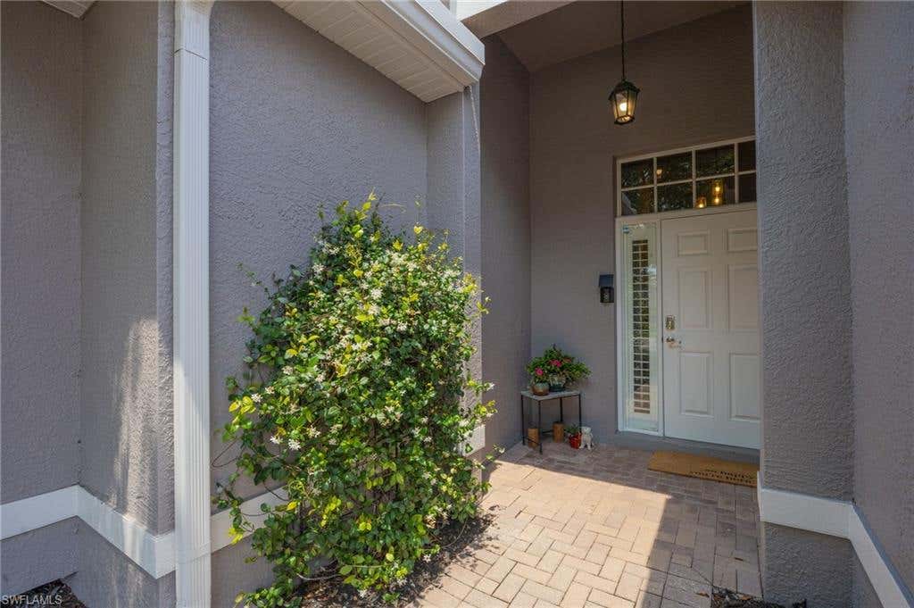 Photo of 219 Glen Eagle CIR, NAPLES, FL 34104 (MLS # 226025473)