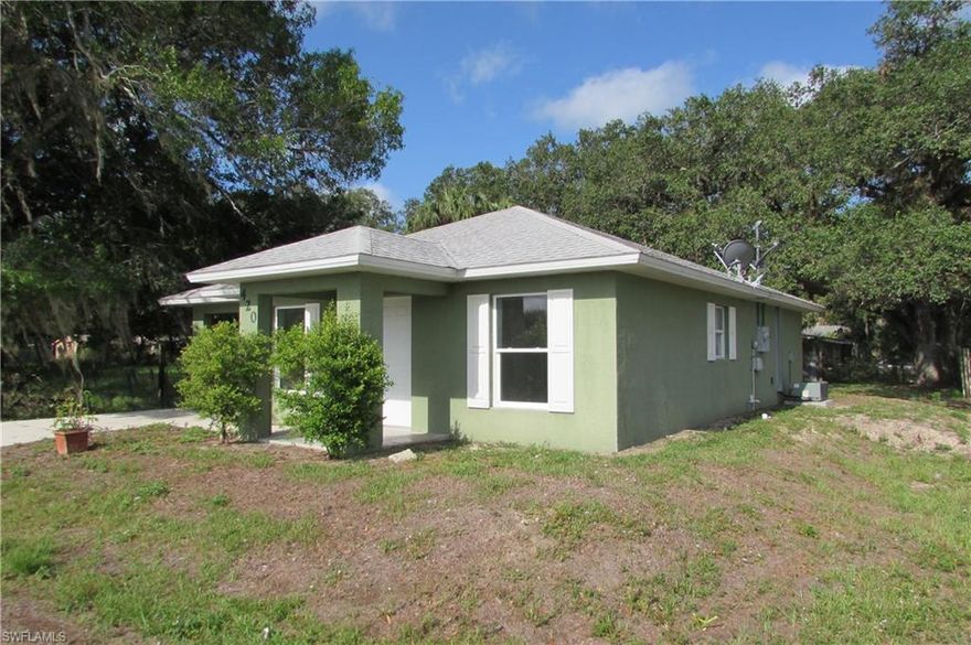 Nice and clean starter home, 2010 concrete block construction, all appliances included, freshly painted, all new tile floors, corner lot, carport. Large living room.