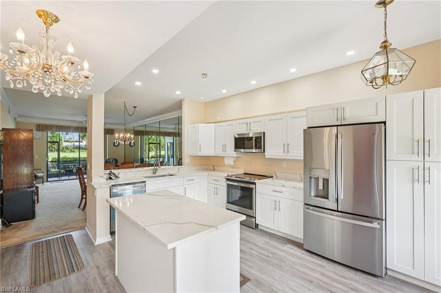 Enjoy peaceful golf course and water views from this spacious first-floor condo in desirable Coventry at Naples Lakes. This 2-bedroom, 2-bath residence offers over 1,100 square feet of living space with a bright, open layout and a larger floor plan than many other buildings in the community. The beautifully remodeled kitchen features updated cabinetry, modern finishes, and ample space for cooking and entertaining. Additional features include crown molding, a partially furnished interior, covered parking, and a screened lanai perfect for enjoying the beautiful Florida setting. Located in a well-maintained 1992 building, residents enjoy access to community amenities and limited golf privileges with social membership. Conveniently located near shopping, dining, beaches, and all that Naples has to offer. Perfect as a seasonal retreat, full-time residence, or investment opportunity.