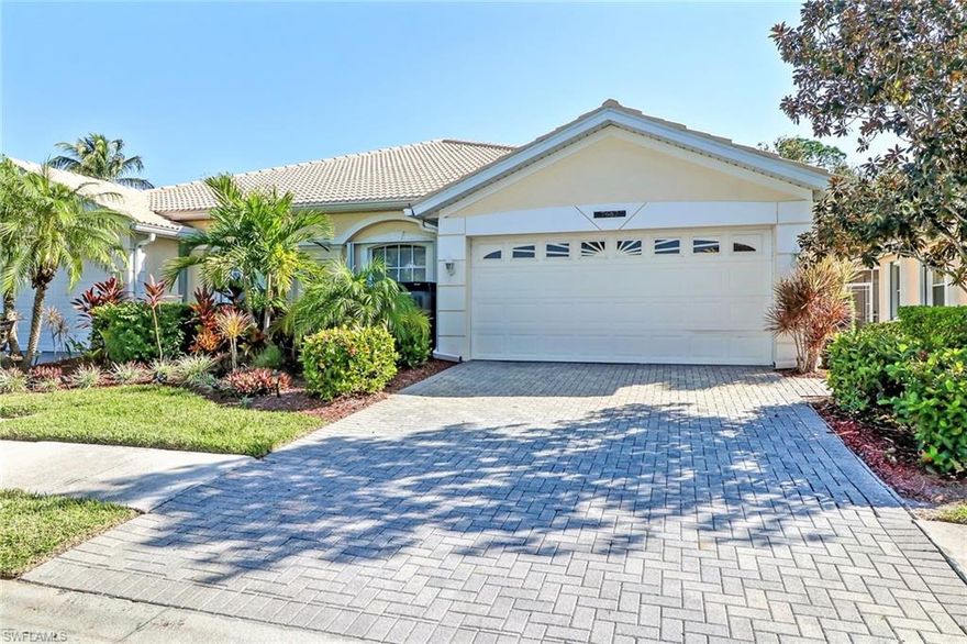 This spacious 3 bedroom attached villa backs to a private preserve & has its own pool. This prime location is quiet & serene, yet is within walking distance to several restaurants, & is just a short drive to the Gulf Beaches, theaters & area parks. Featuring tile throughout, except for the master bedroom & den, the floor plan offers a split bedroom plan, generous 2nd bedroom + 3rd bedroom that could double as an office.  A/C was replaced in 2013 (Trane), water heater in 2016 + the stainless kitchen appliances were replaced in 2013. You'll appreciate the architectural details including the pillars & arch in the dining room, can lighting in the living room and hall, crown molding in the living room, dining room & master bedroom. The kitchen features white paneled cabinetry, + Corian counters. Inside laundry room has a laundry tub & extra cabinetry for storage. All windows + slider have accordion shutters.  Neighborhood amenities include 2 swimming pools, clubhouse, fitness room, basketball,  tennis courts + more! If you 're not sure if you want a condo or a single family home, come look at this villa- it offers the convenience of a condo with the ambiance of single family living.