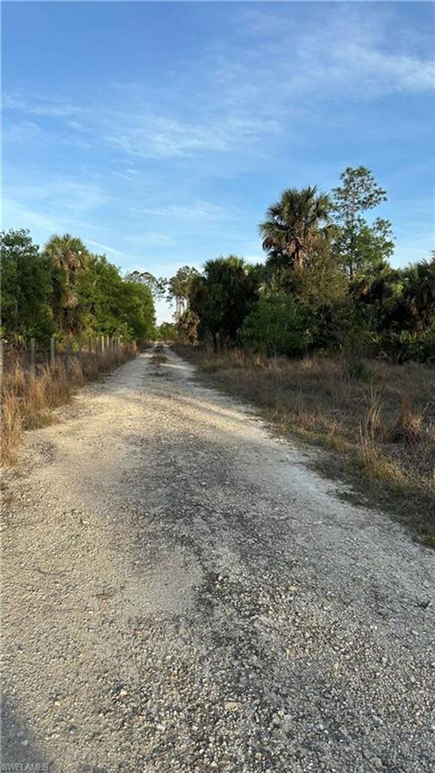 A fantastic opportunity for investors. NEARLY 5 ACRES situated east of Wilson Blvd and south of Golden Gate Blvd. Fully enclosed with fencing! Ideal for horses and other animals. The land seems to be elevated and well-drained, but buyers are encouraged to conduct an Environmental Study, as the seller does not possess one.