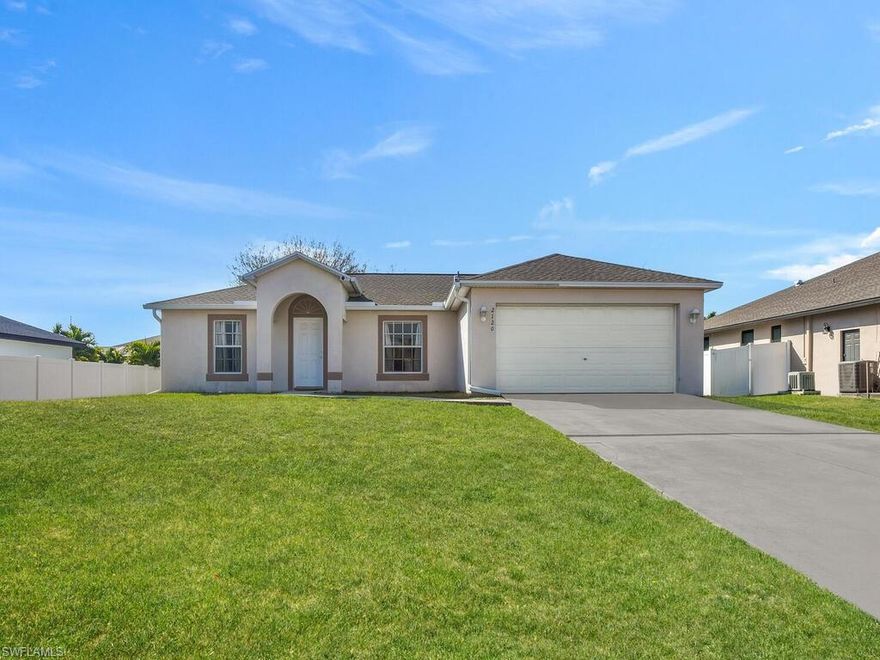 Discover refined Florida living in this beautifully maintained Southwest Cape Coral residence Designed for both comfort and long term enjoyment, this home offers a thoughtful layout with generous living spaces, abundant natural light, and seamless indoor to outdoor flow. The open concept living area creates an inviting atmosphere, while large sliding glass doors frame tranquil views and lead to an expansive lanai perfect for embracing the Southwest Florida lifestyle year round. The kitchen is well appointed with ample cabinetry, solid surface countertops, and a functional layout that connects effortlessly to the dining and living areas, making everyday living both convenient and enjoyable. The primary suite provides a private retreat with a spacious bedroom, and a well designed bath. The two other bedrooms are comfortably sized and positioned to offer privacy and flexibility for a variety of uses or personal preferences. Step outside to a screened lanai that invites relaxation with a view of the backyard which offers additional green space and room to personalize, whether adding lush landscaping, a poo, or enhancing the outdoor entertainment area. Located in the highly sought after Southwest section of Cape Coral near waterfront homes, dining, marinas and easy access to Cape Harbour and Tarpon Point, this property presents a strong opportunity for buyers seeking a primary residence or seasonal escape in a well established neighborhood. With solid construction, appealing curb appeal, and the lifestyle advantages of this prime location, this home delivers value, comfort and the essence of coastal Florida living.