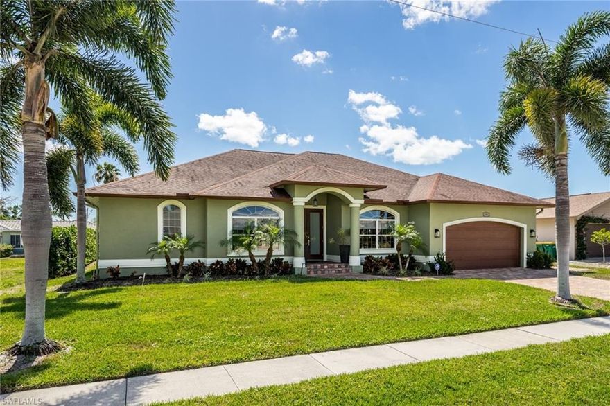 Beautifully remodeled, renovated & upgraded in 2017 3 BR plus office pool home. Paver drive & handsome front elevation.  Detailed with fine contemporary coastal finishings in subtle tones of gray, taupe & white, beautiful tile flows through the entire home.  Volume ceilings & windows all around enhance the light , open Great Rm.  Stunning kitchen is the centerpiece with dramatic marble top island/bar, tile backsplash, extensive cabinetry in grays & whites, designer Kraus stainless sinks & fixtures, stainless appliances including Samsung refrig & Bosch dishwasher & big walk-in pantry. Double French doors open to your handsome office with octagonal cove ceiling.  Split BR plan all with Calif-style closets. Master & Guest/Pool baths boast white coastal cabinets, marble counters & fine fixtures. Laundry Rm has white coastal cabinets, washer, dryer & stainless sink.  SE expo totally private lanai with handsome paver deck & pretty heated pool new in 2017.  Tropically landscaped private backyard is fenced for your convenience. ADA accessible. Ramp in 2 car garage.  Sliders & front door are impact glass new in 2017.  2nd optional like new stainless refrig included for your garage.