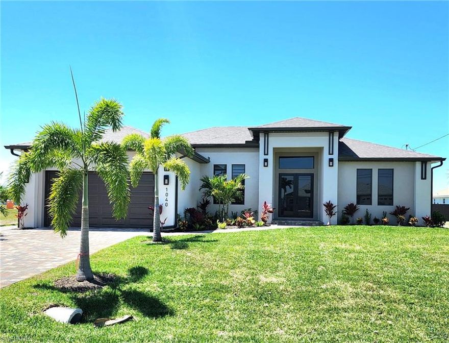 NEW CONSTRUCTION POOL HOME IS READY. Located in the highly desirable NW corridor of Cape Coral. This gorgeous luxury 3/3+ Den/flex home feature open floor plan concept, a large and beautiful kitchen with quartz countertops, wood cabinets with Glass doors, LED and elegant pendant Lights, stainless steel appliances. Ashley furniture TV Stand, TV 75" as well. Oversized breakfast bar with plenty of counter space, comfortable barstools and a pantry. Tall ceiling with double trays , ceiling in living room and Master bedroom , Master Bath has a walk in shower with tempered glass panels, luxury mirrors, waterfall stand alone bathtub combined with his and her vanities. Large laundry room with quartz countertop and sink. Adjustable light intensity throughout the house and ceiling fan in every bedroom. French entrance doors with impact glass, impact windows, 32x32 porcelain tile throughout. Blinds in every window and doors. High garage ceiling to accommodate larger vehicles and a brick paver driveway adds to the beautiful curb appeal. The screened in Pool/Patio has a summer kitchen area with an built-in Grill, a great view of lush palm trees and an upgraded landscaping giving a sense of tranquility can be seen from the inside of main areas of this home . The property includes TV 75" - TV Stand - Barstools that it shown in Listing .Call today for more information and to schedule your private tour.