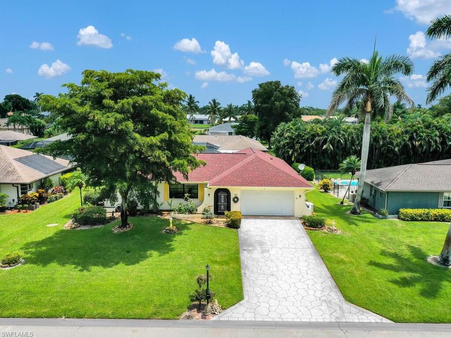 Pool home w/NEW ROOF! Updated home w/ not only a 1 year old roof but brand new lifetime warrantied luxury vinyl flooring and brand new appliances in the kitchen. This home is situated in highly sought out golf community that has a fantastic SWFL location that is ideal for seasonal or annual Florida living. Offering a living & family room layout, galley designed kitchen w/ service window to pool lanai, split bedroom floor plan, 2-car garage (w/ epoxy floor, storage bins, & full size fridge), and huge screened pool lanai (w/ large covered area, pool bath, & above ground spa). Convenient location - close to lots of shopping/dining options, minutes from Marco Island, easy access to US41 & I-75, and just a short drive to the world famous 5th Ave Naples district.