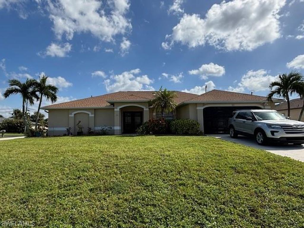 Photo of 3217 SW 12th AVE, CAPE CORAL, FL 33914 (MLS # 2025017829)