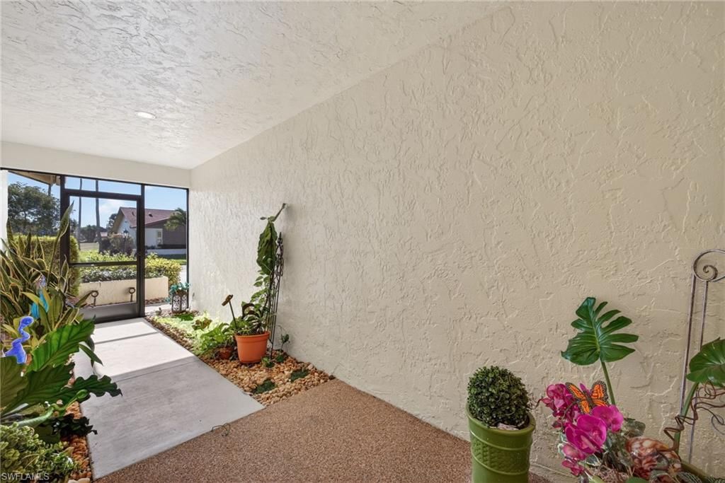 Photo of 303 Reynolds CT #M16, NAPLES, FL 34112 (MLS # 226004027)