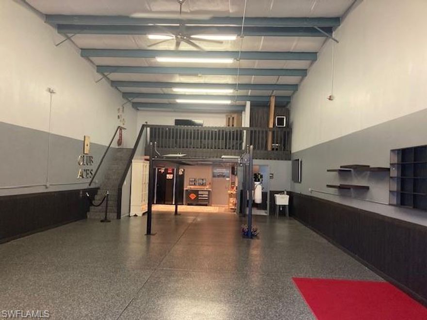 Wonderful gated, climate-controlled luxury motor car/RV condo. Very well maintained complex consisting of 2 buildings with separate entrances and each building has 8 units. Safeguard your recreational investments and have a man cave on the second floor mezzanine level. Only minutes to boat ramps, airport, and many high end communities so you can be close to your property. It has plenty of room to store or re-store your classics. The 1st floor is 25 x 60 and includes a 3/4 bathroom with a shower. Very useful working area under the mezzanine for your toys. The upper level has a large lounge for entertaining and a utility room with the air conditioner & water heater. The tall ceiling height allows you to raise your investments giving you many options. Why wait for new construction to be completed? Purchase a safe storage for your recreational investments plus a man cave all ready to go with many custom finishes. #CarCondo #AutoStorage #LuxuryGarage #ClimateControlledStorage #RVStorage #BoatStorage #CarStorage #NaplesCarCondo #SecureStorage #CarStorage #DreamGarage #CarCollector