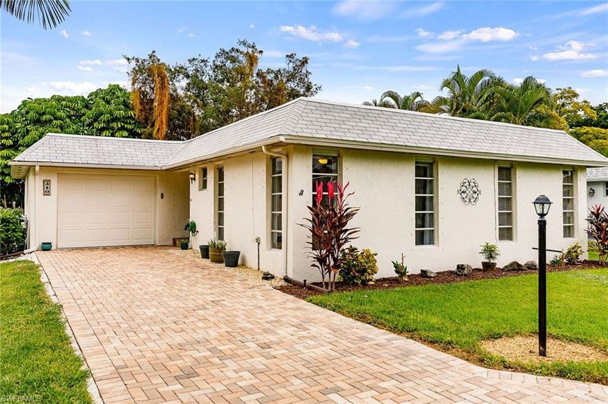 Paradise awaits you in this timeless Florida bungalow-style home. Situated in the Royal Arms Villas Development, less than two miles to prestigious 5th Avenue South and Downtown Naples’ sugar-white sand beaches. This meticulously maintained 2 bedroom, 2 bath plus bonus room home features oversized neutral toned ceramic tiles in the main living areas, a built in wall unit in the living room, mosaic backsplash in the kitchen, zero edge shower in the master bathroom, and mature landscaping on front and rear elevations. This home is move in ready and is the perfect rental investment property.