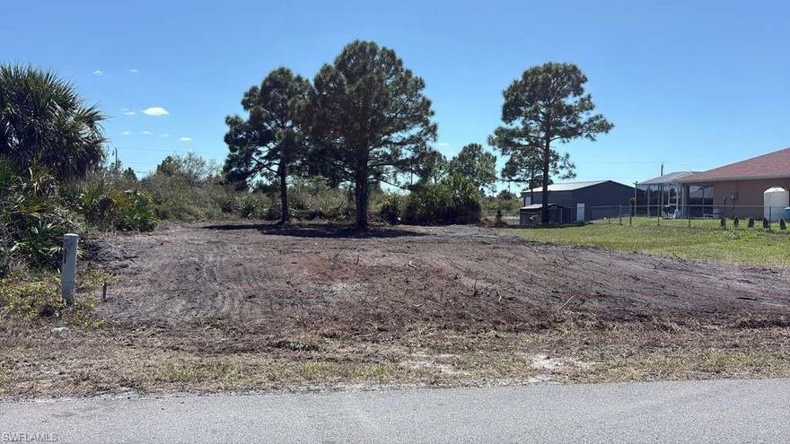 Build your dream home on this ready-to-go residential lot in a desirable area of Lehigh Acres! This 80x136 regular lot is perfectly cleared and prepared, saving you time and money on site work. The lot has been cleared, making the building process smoother and more efficient. Located on a paved road, the property offers easy access and convenience for future construction and daily living.
Situated in a growing neighborhood with nearby homes, this lot provides the perfect balance of privacy and community. Enjoy quick access to major roads such as Sunshine Blvd, Lee Blvd, and Gunnery Rd, making commuting, shopping, dining, and schools easily accessible.
Whether you’re a builder, investor, or future homeowner, this property is an excellent opportunity in a rapidly developing area. Don’t miss your chance to secure a well-prepared lot in one of Lehigh Acres’ most promising locations!