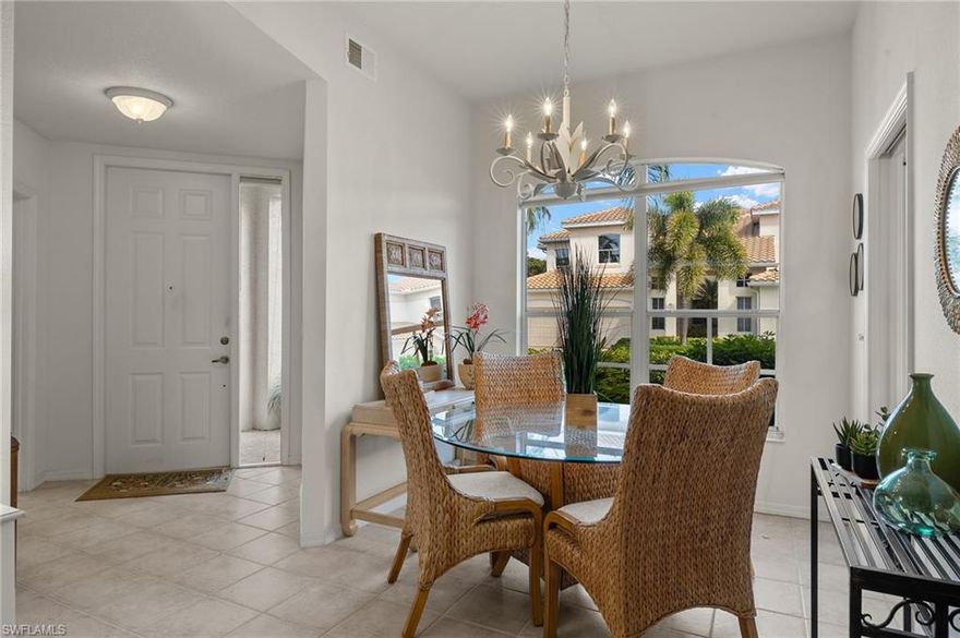 Available only from May 2026 through December 2026. Enjoy your stay in this beautifully appointed 2-bedroom, 2-bath first-floor coach home, ideally located in the heart of Bonita Springs, just minutes from the pristine shores of Barefoot Beach and close to downtown. This inviting retreat offers the perfect blend of comfort, convenience, and effortless coastal living.

Designed with a bright, airy aesthetic, the home features a soft white palette complemented by neutral tones, natural textures, and subtle coastal accents that create a calm, beach-inspired ambiance throughout. The open-concept layout offers a welcoming living space with comfortable seating, light-filled interiors, and a seamless flow into the dining area and fully equipped kitchen—perfect for both relaxing and entertaining.

The kitchen is thoughtfully designed with ample cabinetry, clean finishes, and everything needed for everyday living or extended stays. Large windows and sliding glass doors bring in abundant natural light, enhancing the fresh and inviting feel of the home.

The primary suite offers a serene escape with a well-appointed en-suite bath, while the second bedroom is equally inviting, ideal for guests or family. Each space has been carefully curated to feel comfortable, stylish, and cohesive.

Step out to the screened lanai and enjoy peaceful views, perfect for morning coffee or unwinding after a day at the beach. Every detail of this home has been designed to provide a relaxed, elegant, and truly coastal living experience.