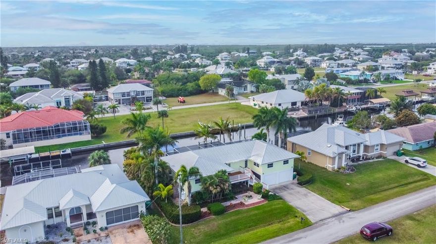 Fantastic Direct Gulf access home. The home features over 3700 sq. ft. living area. No bridges or locks to limit your access to Charlotte Harbor and the Gulf of Mexico.  Within 5 minutes you can be in Charlotte Harbor and directly across from Boca Grande and the Gulf of Mexico. This beautiful pool home features a kitchen with upgraded granite, upscale appliances with master bedroom upstairs  and a mother-in-law suite for the extended family with private bath. All decking on all the balcony and dock are .WearDeck™ Reinforced Polymeric Lumber is made from virgin HDPE and strategically placed co-extruded fiberglass strands. It has no wood content whatsoever, which means it isn’t affected by the weather or insects like wood is.   There are two boat lifts (10,000 lb + 8,000 lb.) that will also accommodate your boat and or kayaks. Downstairs is a bar with its own bar appliances. Plus another bedroom and bath.  Huge family area overlooking the canal and pool.
Pirate Harbor is the best kept secret on the west coast of Florida. Dolphins and manatees around your dock are not unusual. You can be at Boca Grande (Tarpon Capital of the World) and the Gulf of Mexico in minutes via boat.