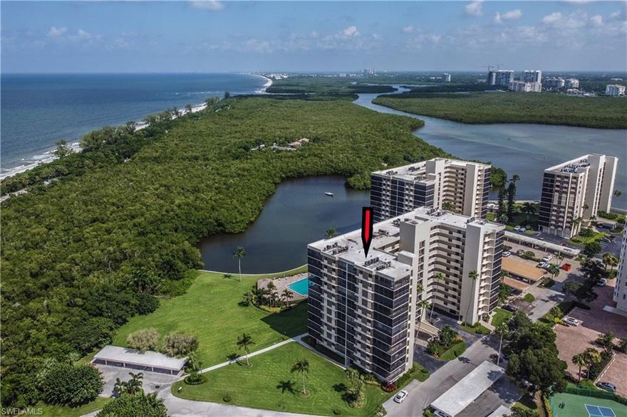 RARELY AVAILABLE CORNER PENTHOUSE, 11th floor condo with panoramic gulf and bay views from EVERY window of this STUNNING condo with expansive wrap around lanai. Have the best of both worlds with breathtaking sunsets and light, warm southern exposure surises. Only a 5 minute stroll to Vanderbilt Beach and Wiggins Pass State Park while providing peace of mind with electric shutters and impact windows plus a coveted covered parking spot right in front of the building. Enjoy your open kitchen featuring gorgeous, "one of a kind", marble waterfall kitchen countertops with high end new appliances. Plenty of room for beach toys and bikes with 2 exterior storage units. FEES COVER EVERYTHING BUT ELECTRIC and 9, 30 day leases are permitted. Vanderbilt Surf Colony I has it all with a Private Lap Pool, Tennis, Pickleball, Bocce and Kayak lease spaces. Marina Boat Docks for lease pending availability. The Vanderbilt Surf Colony lobby has also been completely remodeled to include a fully equipped exercise and social room with kitchen and ping pong table and 11 Bluebill boasts a new roof, elevators, exterior paint and lanais. Nothing to do but sit back and relax and enjoy your condo located on Naples "best kept secret peninsula", tucked away from the hubbub but minutes to Mercato fine dining, shops and entertainment. Paradise awaits!