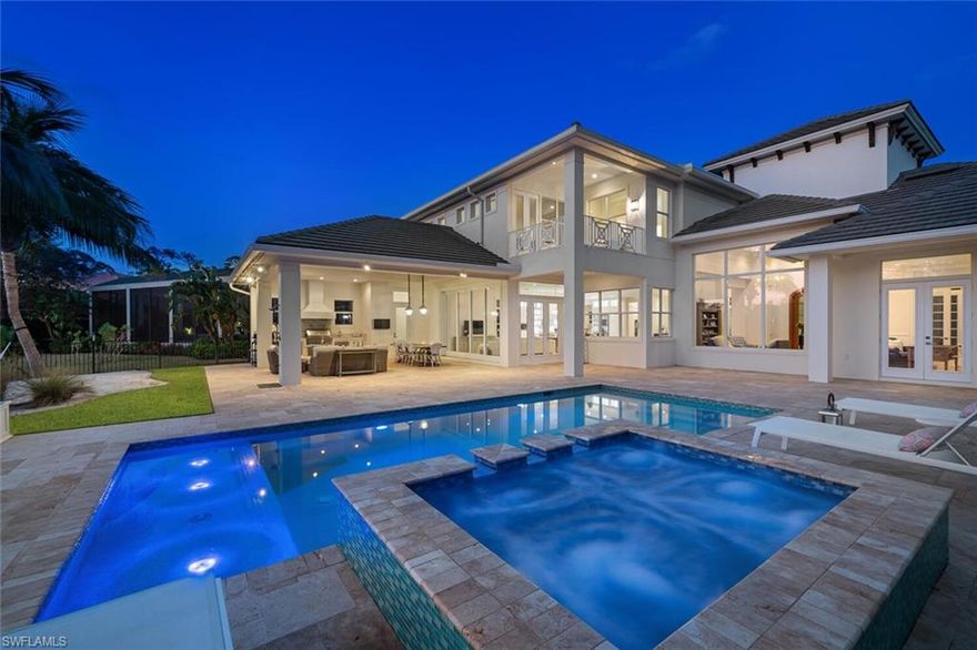 Coastal elegance expertly crafted w/careful attention to detail best describes this exceptional home. Elegant & modern hand scraped maple wood floors provide a warm feeling under foot. An abundance of windows allows natural light to filter through every inch of the wide-open spaces. Enjoy the Ina Garten inspired Chef's dream kitchen w/top of the line custom cabinetry, complete with Wolf and Sub-Zero appliances. Pick your own fresh herbs from the bonus side patio located off of the kitchen. Kick your feet up in the kitchen's inviting fireplace seating area that you won’t want to leave; or relax at the bench seating overlooking the gorgeous pool. Enjoy grilling up your favorites at the custom outdoor kitchen overlooking the beach area w/hammock & a private lake w/preserve view. Other features include two master-sized suites upstairs w/marble baths. A second family room upstairs is perfect for multiple guests or family to enjoy. Detailed features list is in supplements as there are too many to list. See features list and supplements for more details. Located in the award-winning community of Mediterra, this home epitomizes understated luxury & was built to enjoy w/family & friends.