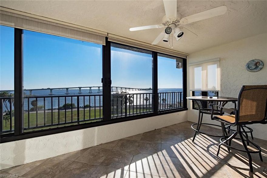 Come Enjoy Relaxing Bay, Bridge and Gulf Views from this Beautiful Top Floor, Totally Remodeled Punta Rassa Residence, which includes an Assigned Covered Parking Space. This move in ready unit boasts Porcelain tile throughout the kitchen and main living areas, a custom marble inlay in the Kitchen and decorative border in Living room. The Guest Suite is Versatile, offering the ability to function as a Den or Work Space with its Built in Desk and accommodate guests with its Hide a Way Murphy Bed. Enjoy an Open Feel, Clean lines and Birch Wood Cabinetry, complimented by Granite counter tops throughout. This unit has been updated with Impact Rated Glass, Sliding Glass Window in the Lanai area and Custom Sun Shades. Punta Rassa offers 3 Fishing Piers, Tennis Courts, Newly Resurfaced Pool, Spa, Cabana, Bayfront Walking Paths and Park like Settings. All buildings have been freshly painted and the on-site Association Management make living at Punta Rassa almost carefree. Come Enjoy the Waterfront Lifestyle. The entire complex is beautifully maintained and adjacent to a Private Marina with slips available separately.