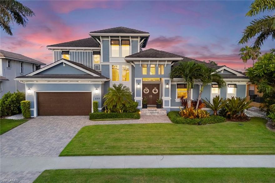 Built in 2019, this contemporary four-bedroom plus den, four-bath waterfront home offers comfort, style and thoughtful design. With the sellers relocating for a new opportunity, buyers now have a rare chance to own this exceptional retreat. Enjoy direct Gulf access from a private dock with boat and jet ski lifts. The open-concept great room features upgraded quartz countertops, a Thermador gas stove and hidden walk-in pantry. Impact pocket sliders lead to the outdoor living area with pool, spa and built-in kitchen, ideal for entertaining. The ground floor includes the primary suite, guest bedroom, den, bath and laundry room. Upstairs, a second living space opens to a balcony with canal views, alongside two guest bedrooms and two full baths. Upgrades include all impact glass, electric sunshades, hurricane shutters, Hunter Douglas window coverings, a 500-pound propane tank, a new seawall (2018) and a whole-house generator (2024).