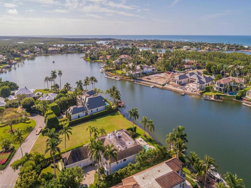 Located on a quiet cut-de-sac, this Port Royal homesite offers wide water views.   The highly desirable western exposure allows for beautiful sunset viewing.  This property offers direct no bridge access to the Gulf of Mexico.  Overlooking the tranquil waters of Smugglers Bay, with a deep water yacht basin that could accommodate a large yacht.   Eligible for Port Royal Club membership .