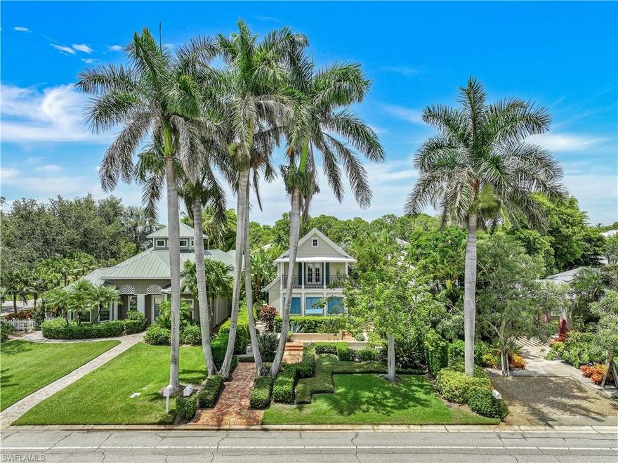 H11092 Positioned a mere 4 blocks from Naples pristine beaches & 5 blocks from vibrant 5th Ave, this captivating bi-level home welcomes w/brick pathways plus manicured lawns & street medians offering 14 parking spaces! The bright, open island kitchen features a walk-in pantry, breakfast bar & spacious dining area. A stunning great room, adorned w/3 sets of French doors, leads to a covered lanai with waterfall feature & a large sunlit spa surrounded by lush gardens, privacy walls and 4 gates.  The private cabana, w/full bath, serves also as a pool and back from the beach shower off! A private alley leads to garage plus 2 additional brick-paved parking spaces. Marble flooring graces the main living areas complimented by impact windows & doors throughout! Two indoor/outdoor staircases lead to bedrooms w/balconies & expansive sky views while a gallery hall of windows guides you to the private master suite & 2 split-plan bedrooms w/baths. Custom features include TV built-ins & ample storage adding a unique touch. Elevated street & home levels ensure no water intrusion. Walk or cycle to NCH Wellness with pool facilities. Envision yourself savoring the allure of sought-after Olde Naples!