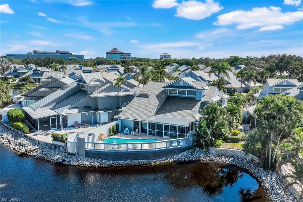 Photo of 635 Bridgeway LN, NAPLES, FL 34108 (MLS # 225075666)