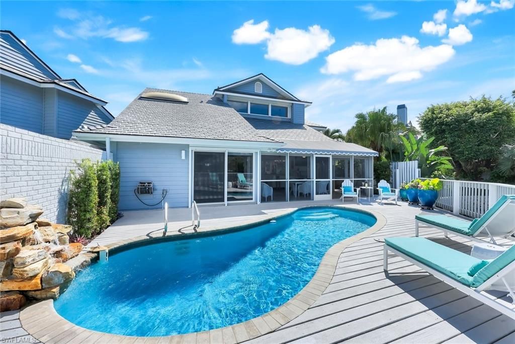 Photo of 635 Bridgeway LN, NAPLES, FL 34108 (MLS # 225075666)