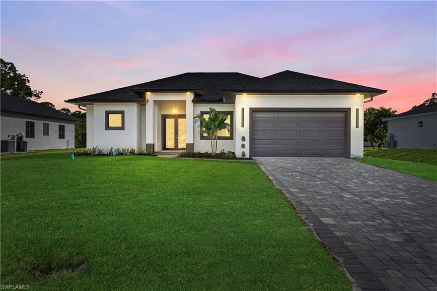 Discover this new construction home in Lehigh Acres offering modern design, quality finishes, and a highly desirable location just behind Lee Blvd with quick access to shopping, dining, schools, and major roads leading to Fort Myers. With no HOA and move-in ready construction, this home is ideal for buyers looking for space, convenience, and long-term value in one of Lehigh Acres’ fastest-growing areas.
This thoughtfully designed property features 3 bedrooms, 3 bathrooms, plus a versatile den, giving you the flexibility buyers are searching for—perfect for a home office, guest room, or additional living space. The open-concept layout is filled with natural light, creating a bright and welcoming atmosphere throughout the home.
The kitchen flows seamlessly into the main living and dining areas, making it perfect for both entertaining and everyday living. Upgraded details such as 8-foot solid wood interior doors add a level of quality and elegance that stands out in today’s new construction market.
The primary suite offers a comfortable retreat with a spacious bathroom featuring dual sinks and modern finishes, designed for both style and functionality.
Step outside and enjoy Florida living with a covered lanai and outdoor kitchen, perfect for entertaining, weekend grilling, or relaxing evenings at home. The home also includes a sprinkler system to help maintain a beautiful lawn year-round.
Conveniently located just minutes from Lee Blvd, this home provides easy access to shopping centers, restaurants, schools, and major routes connecting you to Fort Myers, making commuting simple while still enjoying the space and privacy Lehigh Acres offers.