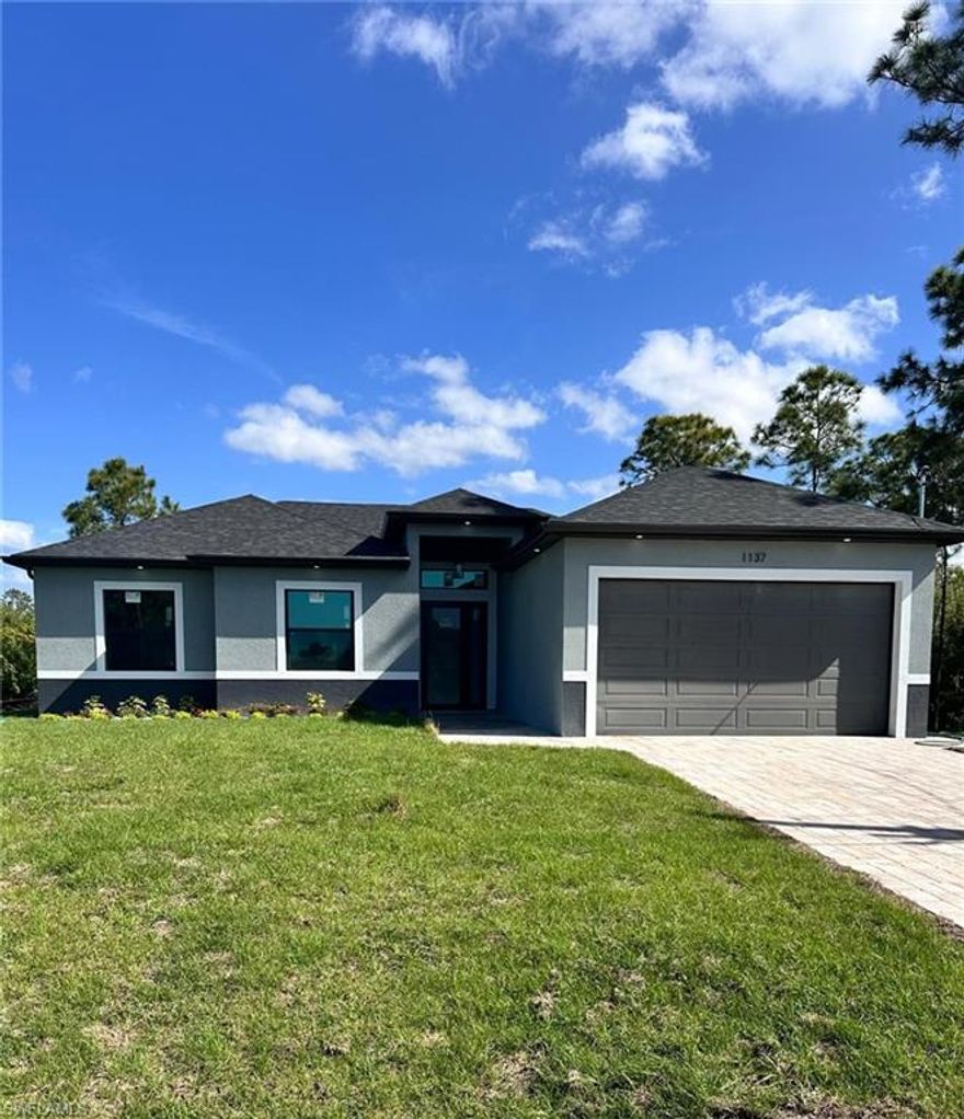 Don't miss out on this 2026 Southwest Florida home accented with porcelain tile all throughout, coffered ceilings, and modern finishes. The property is conveniently located in Lehigh. This stunning space boasts a fully custom kitchen complete with stainless steel appliances, quartz countertops, with a hood, and custom made cabinetry. Create memories in the beautiful living room featuring a remote controlled ceiling fan and an open space floor plan. Enjoy the spaciousness of 3 bedrooms with den and 2 baths. Other features include washer and dryer, impact resistant windows. Your dream home awaits, schedule your showing today! The seller will contribute $10k to the buyer's closing cost.