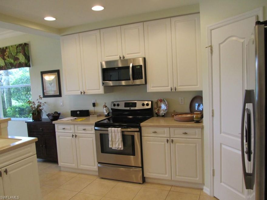 Rare 1st floor Dorchester model!! Featuring just under 2000 sq ft of living space! This 3 bedroom plus den, 2 bath coach home offers formal dining room, living room, dinette and a 2 car garage. This condo has crown molding thoughout, tray ceilings, 7 ceiling fans, fresh paint and is very bright and spacious. Beautiful furniture is negotiable. Act fast as this one won't last long.
