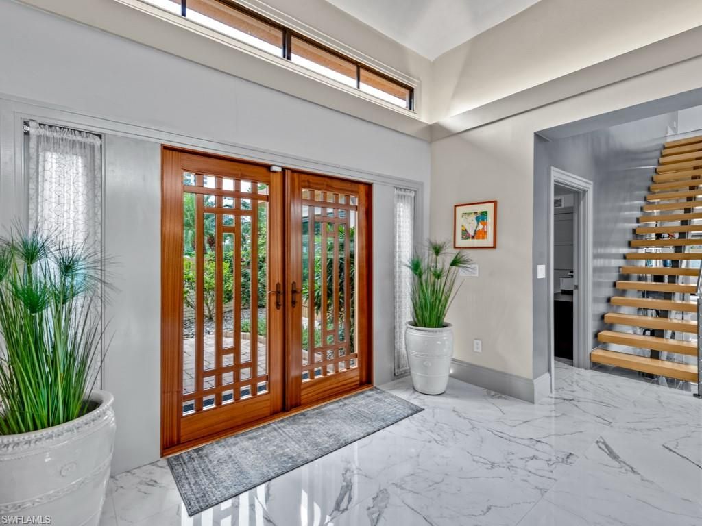 Photo of 6734 Pelican Bay BLVD #61, NAPLES, FL 34108 (MLS # 225076024)