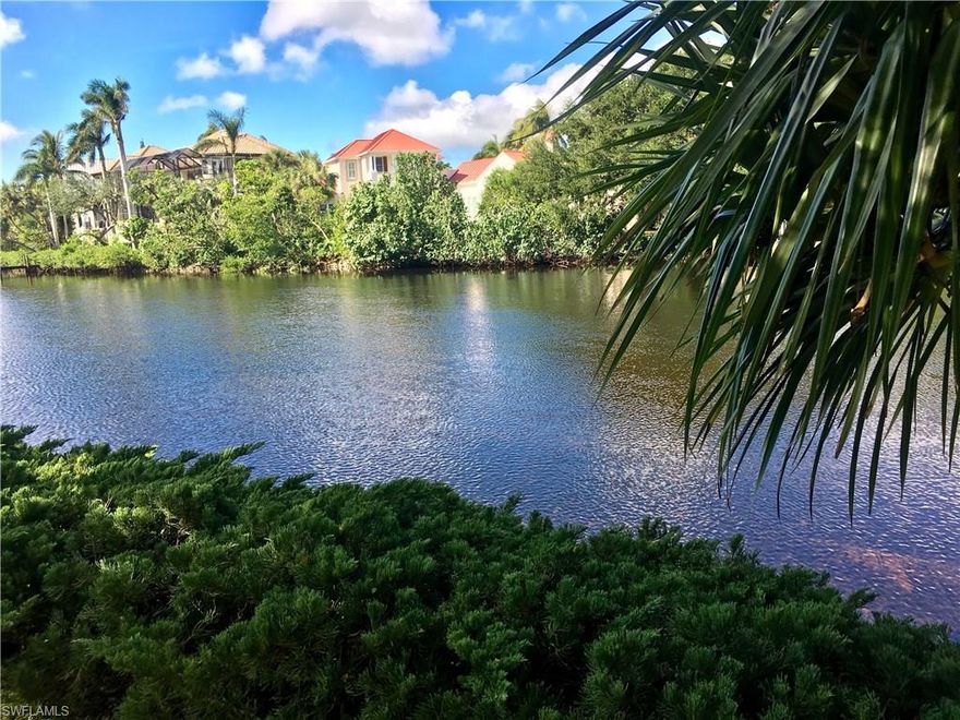 Watch the mullet jump and the manatee/dolphin play from every angle of your riverfront home with the bay in your backyard! High elevation.  Also enjoy the wildlife in the adjacent privately owned lot which has lush landscaping and professionally manicured.  Only a few minutes to the gulf by boat from your boat lift.  New marble flooring.  Romantic wood burning fireplace.  Interlocking pavers.  Hot tub overlooking the river.  Call now for a private viewing of this rarely available home.