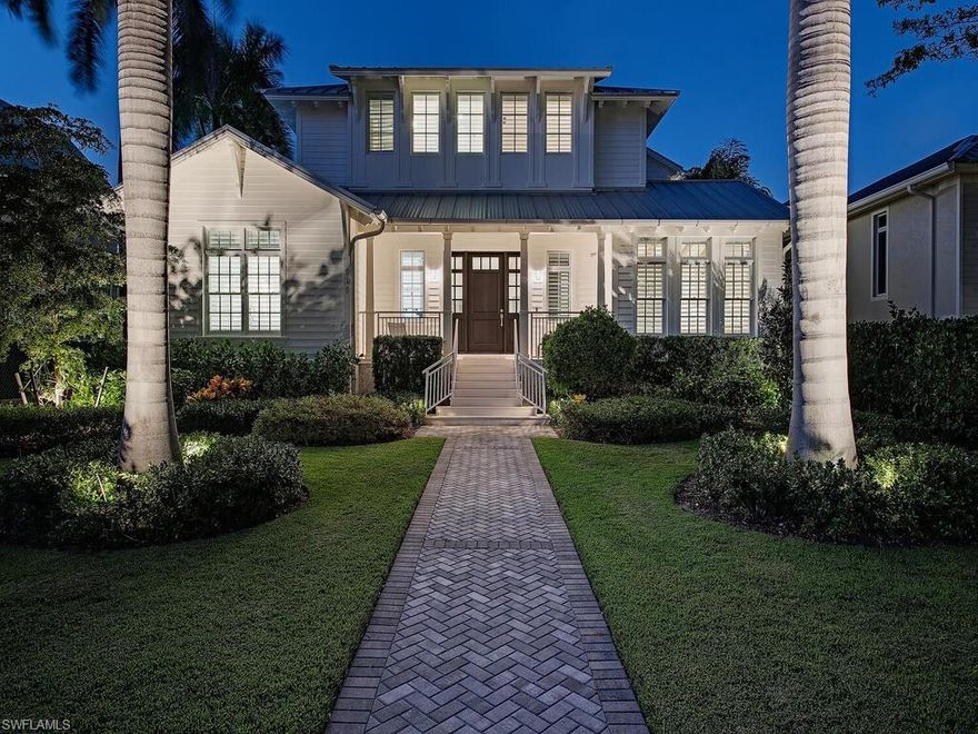 Built above FEMA to 11' with a whole home generator, no flood damage in recent storms, this stunning 2017 Old Naples cottage design is low maintenance and built to last. The exceptional location just one block off the beach and walking distance to both 5th Avenue and Third Street shopping and dining districts is hard to find. Penned by Stoft Cooney architects and crafted by Toscana Homes. The interiors are beautifully appointed and furnished by Bay Design with Wolf & Subzero appliances showcased by Elmwood custom cabinetry and mitered quartzite counter tops. White Oak flooring throughout. Luxurious white marble and glass-porcelain tiles adorn the baths. Premier Systems designed the home, security and lighting controls via Lutron, Savant, and Sonos audio. Full concrete block construction with a standing seam metal roof, motorized lanai screens and shutters, elevator, and impact glass windows and doors. Two car garage is equipped with side mount motors and 15' height for future car lifts, or space to add on.
