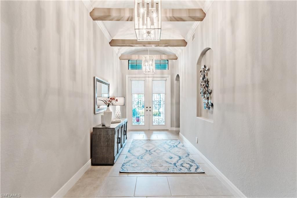 Photo of 10102 Palazzo DR, NAPLES, FL 34119 (MLS # 226009967)