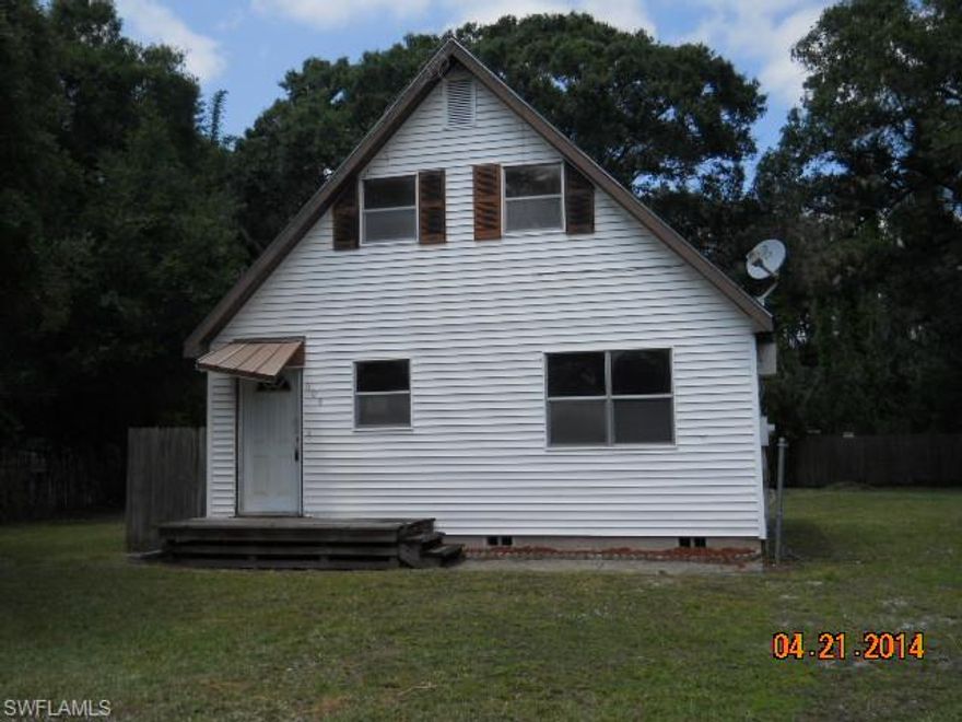 3 bedroom 1 bath two story home on a quiet street with built-in bookshelves upstairs and attic access via vertical door. This home is a great deal.
