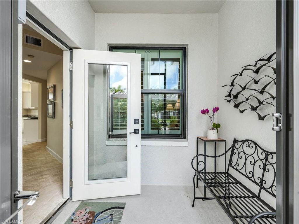 Photo of 2444 Ravenna BLVD #101, NAPLES, FL 34109 (MLS # 226015007)