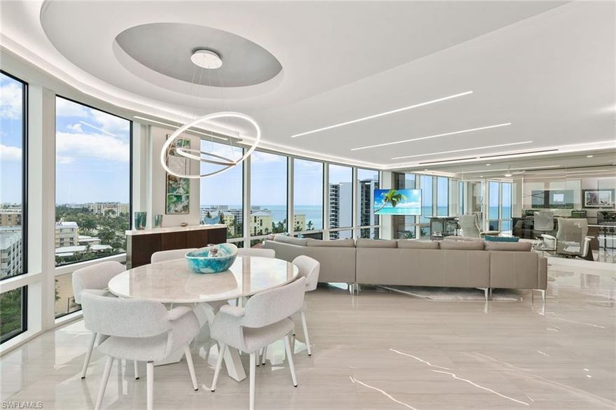Captivating panoramic water views await from one of the most desirable buildings on Gulf Shore Boulevard. This impeccably, fully renovated residence by Spears Construction is complemented by a bespoke lighting design that sets off the vistas of Naples' world renowned white-sand beaches. The modern, open floor plan showcases breathtaking views of Venetian Bay and the Gulf while the chef's kitchen features three Cristallo underlit preparation surfaces, Scavolini custom cabinetry, high-end Miele appliances and a sparkling water beverage center and coffee bar. Invisible Sonance speakers and linear ductwork are integrated throughout the residence. Electronically controlled shades, 24x47-inch porcelain tile, LED soffit pockets and various smart technology features offer peace of mind. Le Ciel Venetian Tower provides unrivaled amenities, including guest suites, a well-equipped exercise room, two assigned parking spaces, a spacious bike room and storage space, all within a pet-friendly environment overseen by a full-time attentive concierge. This idyllic location is within walking distance to Venetian Village and minutes to the fine dining, galleries and entertainment of downtown Naples.