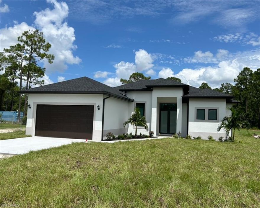 !!! GREAT LOCATION !! NEW CONSTRUCTION!!! BEAUTIFUL 3 BEDROOMS PLUS A DEN , 2 BATH AND 2 CAR GARAGE SITS ON 1.14 ACRES LOT.... THIS BRAND NEW HOME ALSO FEATURES A BRIGHT & OPEN FORMAL LIVING & DINING ROOM, IMPACT WINDOW, GRANITE COUNTER TOPS, STAINLESS STEEL APPLIANCES, TILE FLOOR WITH SPLIT BEDROOM, WALK-IN CLOSET IN MASTER BEDROOM, AUTOMATIC IRRIGATION SYSTEM, ASPHALT DRIVEWAY, AND MORE... BRING YOUR FAMILY AND YOUR PETS AND MAKE THIS HOME AN AWESOME PLACE TO LIVE **VERY PRIVATE AND CONVENIENTLY LOCATION NEAR SHOOLS AND PUBLIX SHOPPING CENTERS. '' WASHER,DRYER AND MAIL BOX ARE NOT INCLUDE''. ** HOUSE IS ON SUPRA