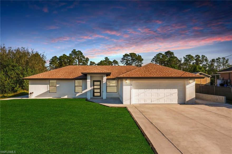 Seller contribution of 10k to closing cost.!!! Ready to move in. 2022 New Construction 3 Bed + Den, (den has a closet and it’s a big size that it could be use as a 4th bedroom,) 2 Bath. Modern gray vinyl plank flooring throughout. Open concept, zebra blinds, impact windows, Custom modern impact front door, vaulted ceilings provide plenty of natural light when in the main area. All white kitchen cabinets and counter tops, garbage disposal, along with an island. Bathrooms has all white cabinets and countertops with a double sink and a tiled shower in the master. Master has his and her closet. The home has cement all around the house, very little grass to maintain. Modern custom mailbox, washer and dryer. home is located in one of the best neighborhood of Lehigh Acres. This home has everything you want as a new construction and so much more.! Easy to show.!!