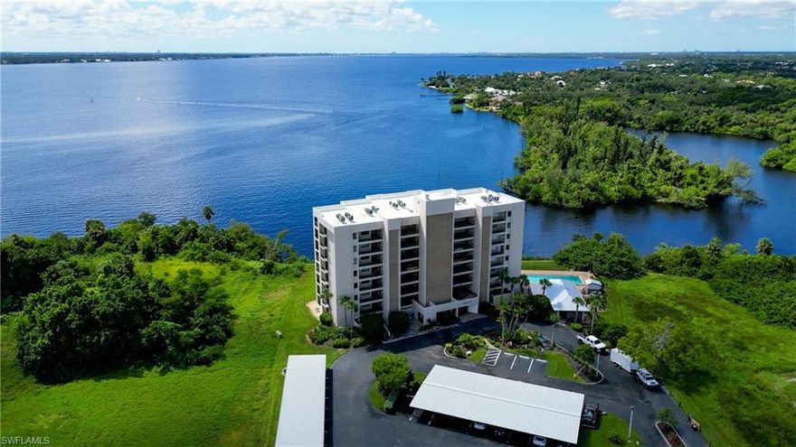 Every once in a while, an OPPORTUNITY comes along that gets the BIG THINGS RIGHT: the VIEW, the VALUE and the VIBE. Riverfront condos that impress visually, are beautifully updated and still make financial sense are rare—but this sixth-floor residence at Moorings Point DELIVERS all three. Set along the banks of the Caloosahatchee River, MOORINGS POINT CONDO is a gated, boutique community tucked at the end of a quiet cul-de-sac, offering residents privacy, peace of mind and a front-row seat to ever-changing river views. The atmosphere is warm and personal, enhanced by a sparkling riverfront pool, clubhouse, grilling area and a friendly environment where neighbors from all over the world quickly feel at home. Minutes from vibrant downtown Fort Myers, shopping, dining, entertainment, and everyday conveniences—yet you feel worlds away in your own riverside retreat. This SIXTH-FLOOR residence delivers ELEVATED RIVER VIEWS that are nothing short of captivating. From sunrise reflections dancing across the water to evening skies glowing over the river, the view becomes part of daily life. This thoughtfully updated 2-bedroom, 2-bath condo blends timeless finishes with modern comfort, creating a home that lives beautifully year-round or seasonally. You’ll LOVE the beautifully UPDATED KITCHEN with white shaker-style wood cabinetry with soft-close drawers, GRANITE countertops and stylish backsplash. The microwave is a STATE-OF-THE-ART 3-IN-1 CONVECTION OVEN, MICROWAVE AND AIR FRYER. Both the primary and guest bathrooms have been tastefully updated similarly. The primary suite offers peaceful water views, BUILT-IN CLOSET ORGANIZERS and a serene place to begin and end each day. One of the most loved spaces in this home is the FULLY ENCLOSED LANAI, it’s flexible design is perfect for all-season enjoyment. This cozy, light-filled spot invites you to grab a book you can’t put down, linger over morning coffee or simply watch boats glide by for hours at a time. Additional highlights include NEW IMPACT GLASS WINDOWS AND SLIDERS with PLANTATION SHUTTERS, a NEW HVAC SYSTEM (2023), COVERED CARPORT #56 and private storage. The building itself features a NEWER ROOF, BRAND NEW EXTERIOR PAINT and planned resurfacing of the pool and parking areas this year—enhancing both curb appeal and long-term value. Condo fees include water, sewer, pest control, exterior building maintenance and insurance, grounds care, reserves and professional management—allowing residents to truly relax and enjoy the Southwest Florida lifestyle. Life at Moorings Point means mornings with river views, afternoons enjoying nearby beaches, golf courses and nature preserves and evenings dining at waterfront restaurants or soaking in the cultural energy of downtown Fort Myers. This is not just a condo—it’s a way of living. VIEW, VALUE, AND VIBE come together effortlessly in this special riverfront residence. Call today to experience life at Moorings Point. You’ve worked hard … you DESERVE THIS!