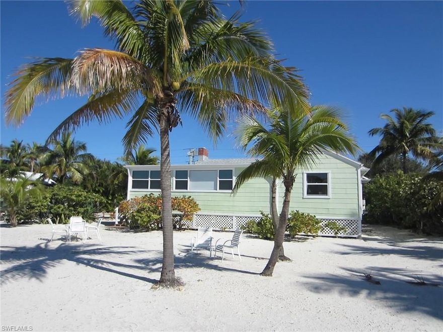 Coastal beachfront  cottage with a separate guest house available on Fort Myers Beach. Expansive windows allow for a stunning view of the Gulf of Mexico and sunsets. This beautifully maintained 4 bedroom, 2 bathroom cottage also features a wood burning fireplace. The 2 bedroom, 1 bath guest house makes an ideal in-law unit, private getaway for guests, or a perfect rental opportunity. With more than 70 feet of prime beachfront and a separate guest cottage or rental cottage, this home offers an unbeatable opportunity.
