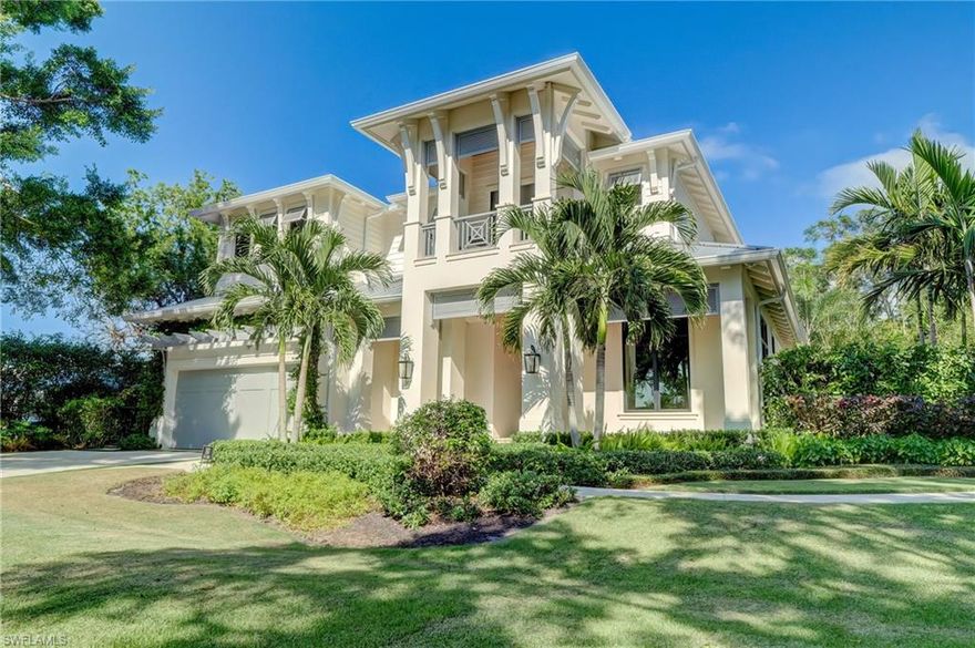 H7593 - A residence where paradise is truly met with luxury! Built by Van Emmerik Custom Homes, this 2-story, four bedroom, four & one half bath home features a welcoming open concept living throughout the home, beginning with the beautiful great room adjacent to the well designed kitchen, walk-in pantry & dining area. The first-floor owner's suite has abundant natural light, generous space & a spa-like bathroom. Three upstairs guest suites, each with its own private bath & walk-in closet, with timeless neutral tones and Restoration Hardware fixtures, can enjoy a loft living space with morning or evening hospitality bar.  Additional ground floor living is accessed by recessed sliding doors with outdoor living, dining space & fully equipped summer kitchen. In Flood Zone X, this oversized, stunning lot has beautiful, private gardens surrounding the home. Limestone floors from the front door to the back fence radiate a feeling of opulence. The morning sun-drenched pool with sun shelf & spa is perfect for relaxation or entertainment.   Essentially located in the center of Naples, with access also to the private Moorings Beach.