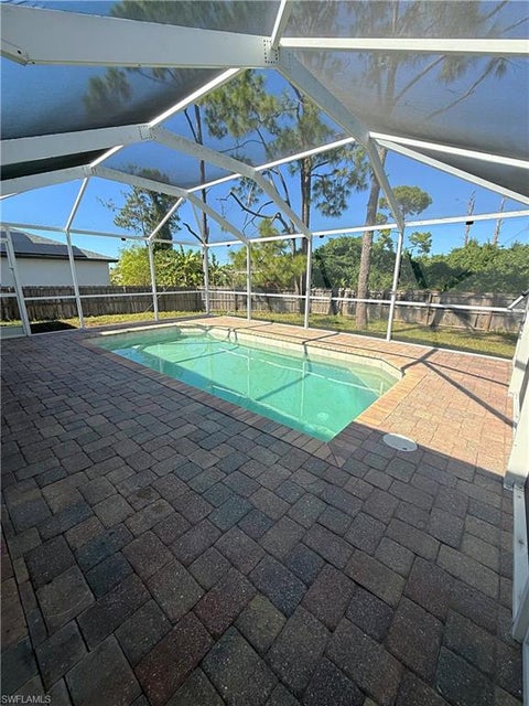 Photo of 3122 12th ST SW, LEHIGH ACRES, FL 33976 (MLS # 226028885)