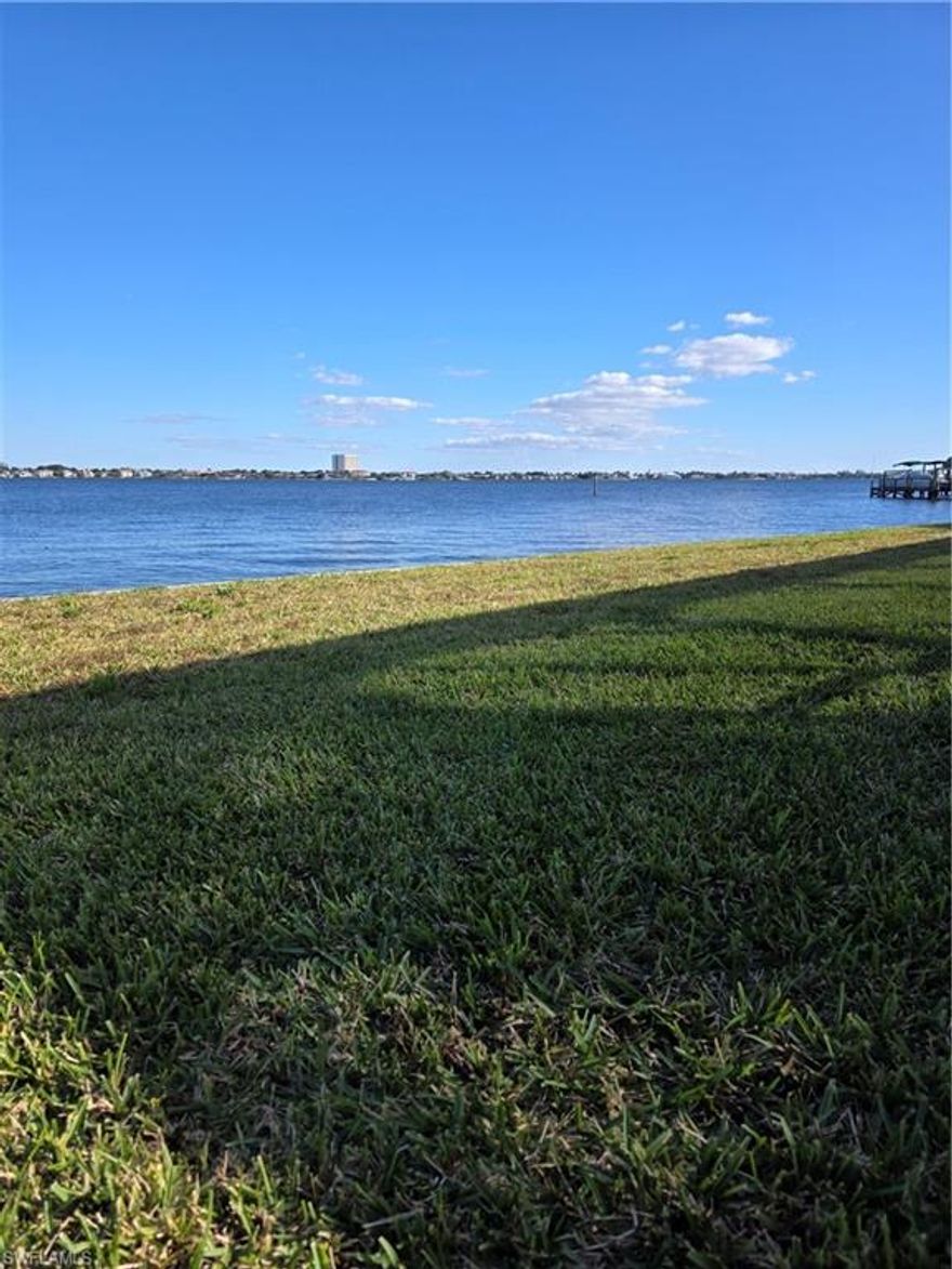 Outstanding Oversized Riverfront lot with Opportunity for Boaters & Investors.Exceptional riverfront property offering approx. 150 ft. of frontage along the Intracoastal Waterway / Caloosahatchee River. Features a recently installed high-panel seawall with riprap, providing lasting shoreline protection and peace of mind. Enjoy the beautiful sunrise views and moonlit reflections over the water. This property offers a front-row seat to the annual Red, White & Boom fireworks event, making it an ideal setting for entertaining or relaxing while observing local sea life. The vibrant entertainment district is within walking distance, featuring restaurants, shops, city-hosted events, and a new food truck park with boat slips, fuel dock, bar, entertainment, and a ship store—perfect for an active boating lifestyle. Nearby airports, marinas, yacht clubs, and area beaches add further convenience and appeal. Take your boat directly from your backyard to explore waterfront restaurants, beaches, and barrier islands. A unique opportunity for investors or those seeking to create an expansive riverfront estate. Located within the CRA District, offering additional development potential and incentives (verify with local authorities). Million-dollar water views and endless possibilities await. The Southwest Florida lifestyle is calling. SW FL awaits you- What are you waiting for?