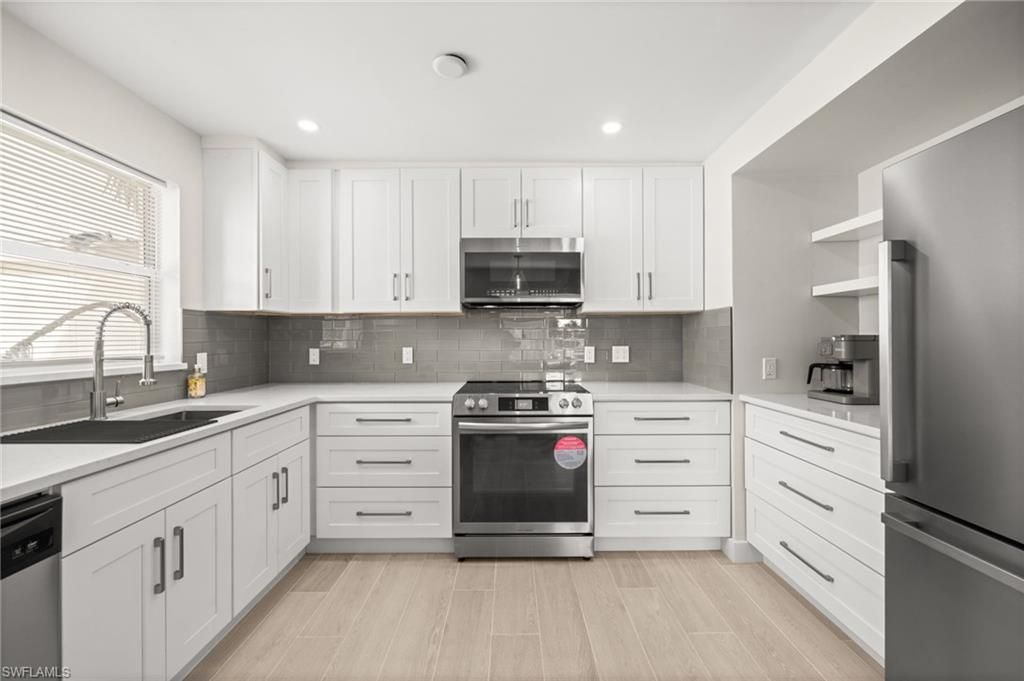 Photo of 1549 Sandpiper ST St #83, NAPLES, FL 34112 (MLS # 225083825)