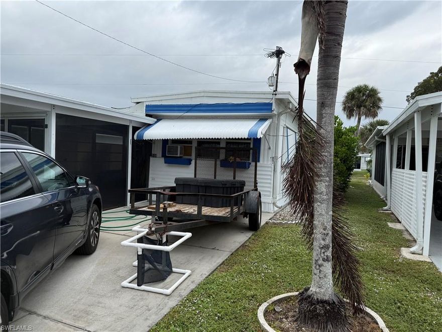 This 2 bed/2 bath home is waiting for your touches. That's right it's a fixer with a lot of potential OR, you might consider replacing it with a mobile home permitted tiny home. This home is located in close proximity to the Holiday Manor Clubhouse,  beautiful gulf beaches of Marco Island and Naples, Downtown 5th Ave with plenty of shopping and restaurants, and also provides a boat ramp with GULF ACCESS. Holiday Manor is a warm and friendly 55+ community with amenities that include a clubhouse, pool, shuffleboard and LOW HOA fees. Community is suitable for year round or winter getaway but does not allow pets. Buyers must have a 700+ credit score. Set up your showing today!