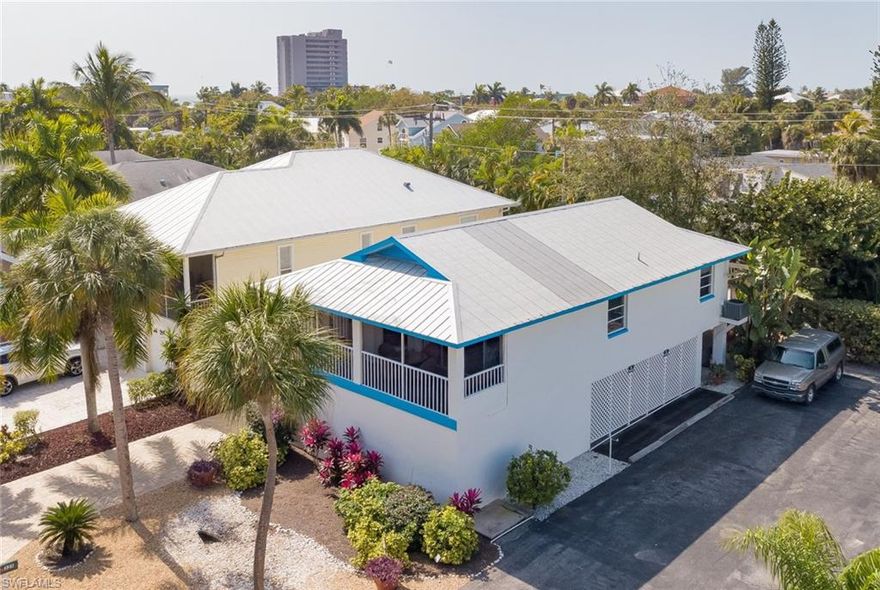 LOCATION! LOCATION! LOCATION! Just steps to the white sand of Fort Myers Beach! This ABSOLUTELY ADORABLE, FURNISHED BEACH HOME HAS BEEN REDONE TOP TO BOTTOM, nothing to do here!! Everything from new HVAC system, water heater, appliances, to remodeled kitchen and baths, new wood like tile flooring! Newly painted inside and out, new electrical panel for whole house generator and NEW HOT TUB. LARGE SCREENED LANAI TO RELAX AND ENJOY VIEWS of the Mangroves and feel that gulf breeze...Extra large two car garage to keep all the toys! Concrete Block Construction and fire sprinkler system for added piece of mind. Allows for one week rentals, making this a GREAT INCOME PRODUCING property with an average of approx. $70,000 annually.  This fabulous beach bungalow is WALKING DISTANCE TO ALL THE FUN!! TIMES SQUARE SHOPS, RESTAURANTS AND PIER!!  Don't miss out on this wonderful island home! BE SURE TO CHECK OUT THE 3D VIRTUAL TOUR!