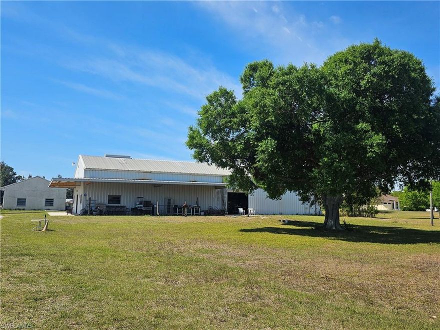 Everything HAS been cleared from warehouse. Updated photos coming soon!
2 buildings with 5,200 square feet total! AVAILABLE DECEMBER 2025!
1st building: 4,000 sq ft in total with 3 drive in bays (3,050 sq ft - warehouse/ 950 sq ft office space with kitchenette/ additional 950 sq ft - upstairs loft/storage)
2nd building: 1,200 sq ft - detached warehouse with 2 drive in bays
Both buildings available for long term rent! Located off Buckingham Road in Fort Myers on 14 acres (owner's residence also on property with separate address). One full bathroom and one half bathroom. ZONED FOR AGRICULTURE 2. Maintenance and property taxes taken care of by owner. 3 phase electric. Water is on septic. Warehouse has it's own private front and rear entrances. Non-assigned parking on grass next to warehouse. Owner willing to negotiate if leaseholder only wanted to rent out the larger warehouse/office space/upstairs loft with 4,000 square feet. Leaseholder to pay utilities such as electric.